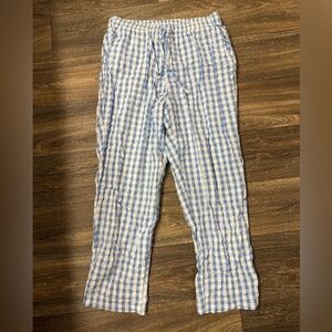 Woman Within Blue and White Checkered Pants